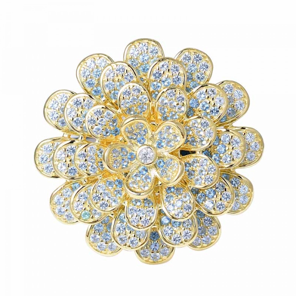 anello a forma di fiore in oro giallo con zaffiro blu a cambiamento graduale 