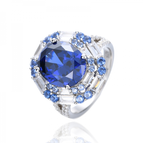 Anello rotondo in argento con nano rodio e tanzanite di forma ovale con zirconi cubici 