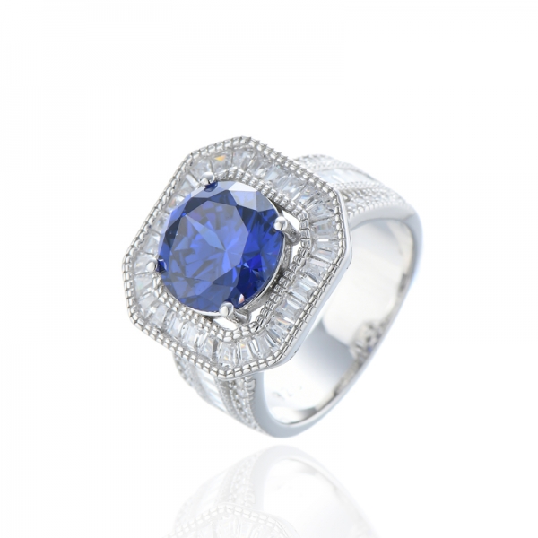 Anello rotondo in argento rodiato con tanzanite e zirconi bianchi 