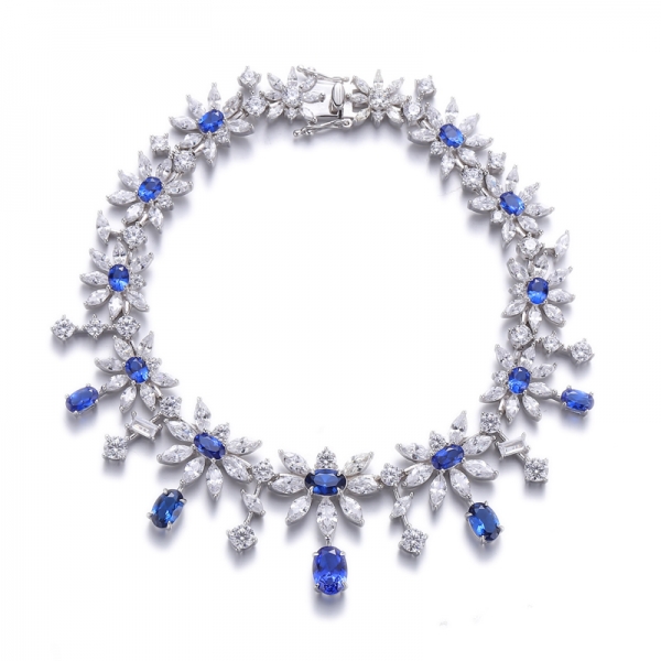 Bracciale in argento rodiato con zirconi bianchi e nano blu di forma ovale 