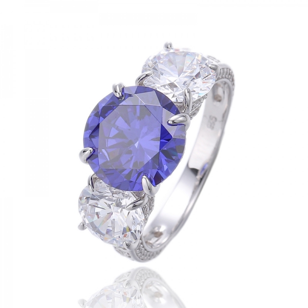 Anello in argento rodiato con tanzanite rotonda 925 e zirconi bianchi 