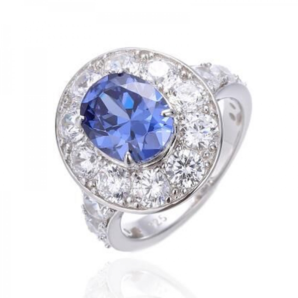 Anello in argento rodiato con tanzanite di forma ovale 925 e zirconi bianchi rotondi 