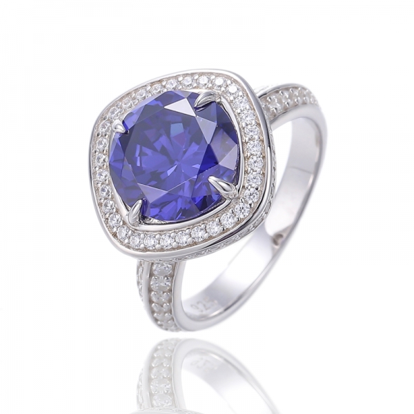 Anello in argento rodiato con tanzanite di forma rotonda 925 e zirconi bianchi 