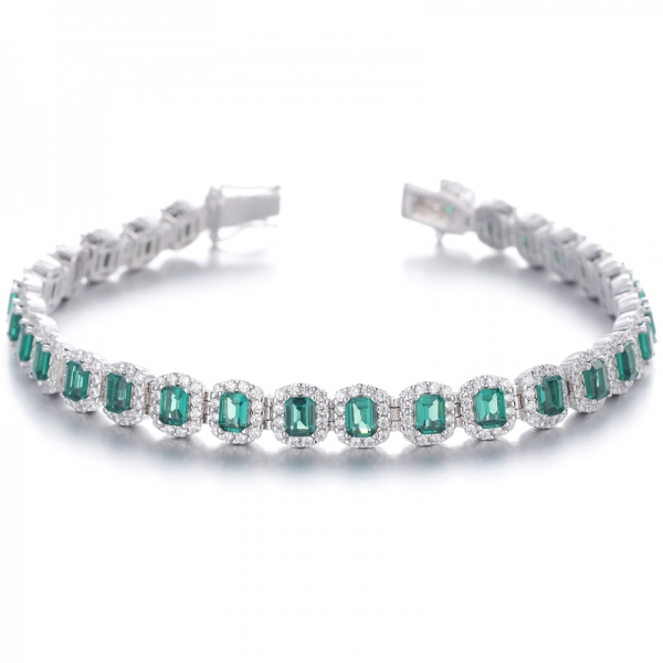 
     Bracciale in argento rodiato nano verde taglio smeraldo e zirconi bianchi rotondi
     