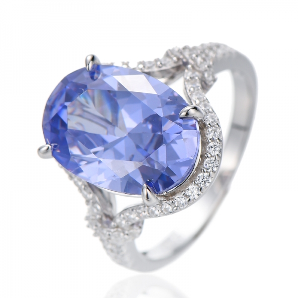 oval shape tanzanite and round white cubic zircon rhodium plating silver ring 