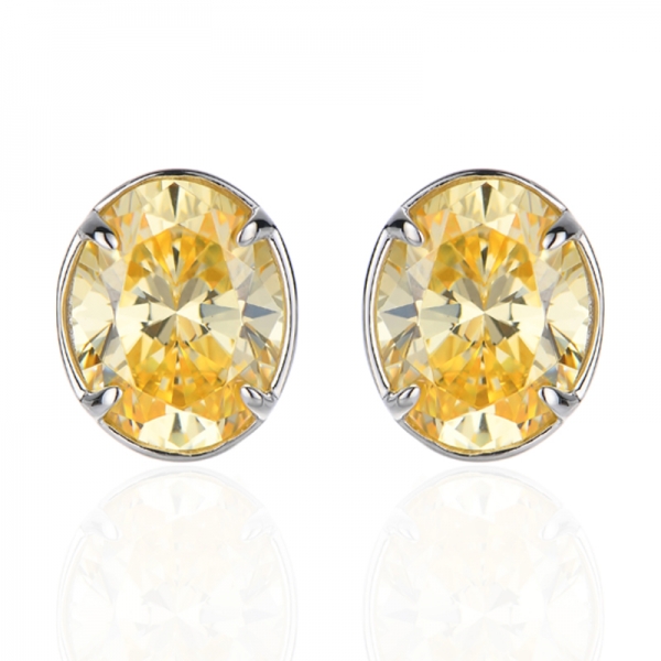 Orecchino in argento 925 con zirconi cubici bianchi e gialli rotondi, placcato rodio, con diamanti di forma ovale. 